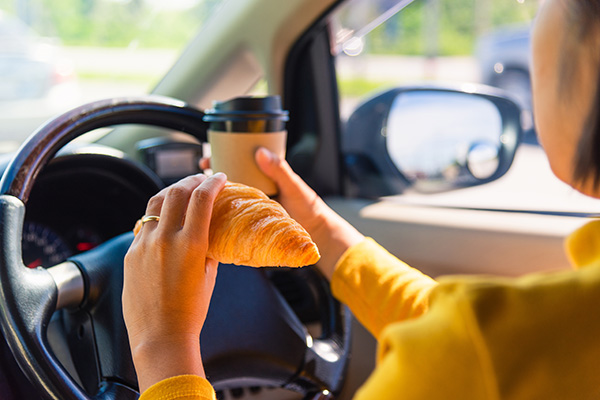 Is Eating While Driving Dangerous? | Sunny Service Center